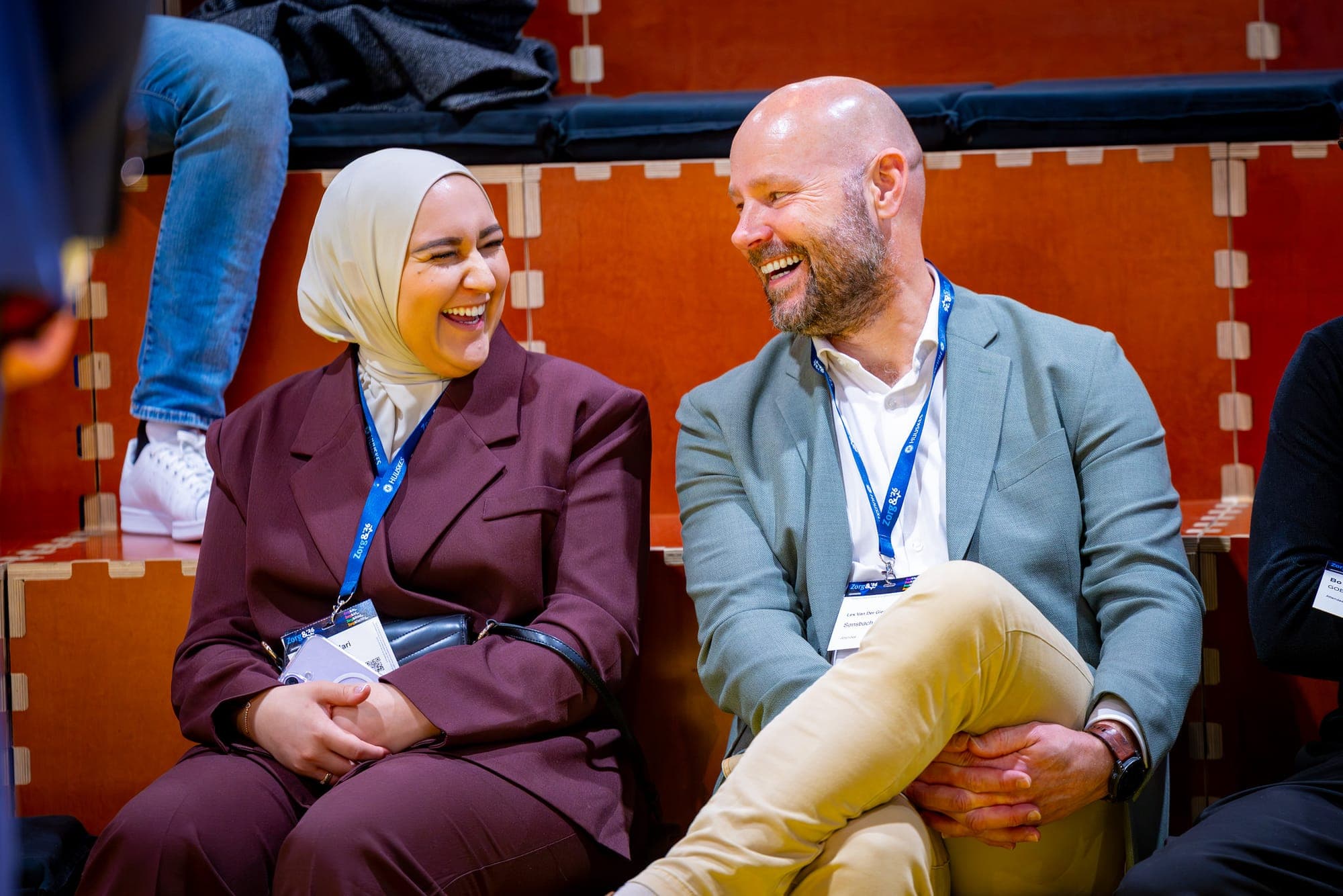 Smiling visitors at a trade fair